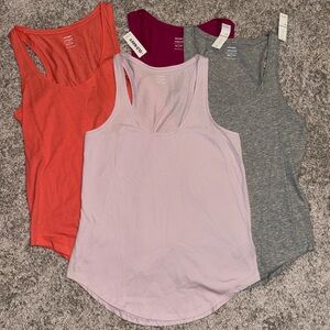 Old navy relaxed XS heathered gray racerback tank top. Scoop/tulip hem.